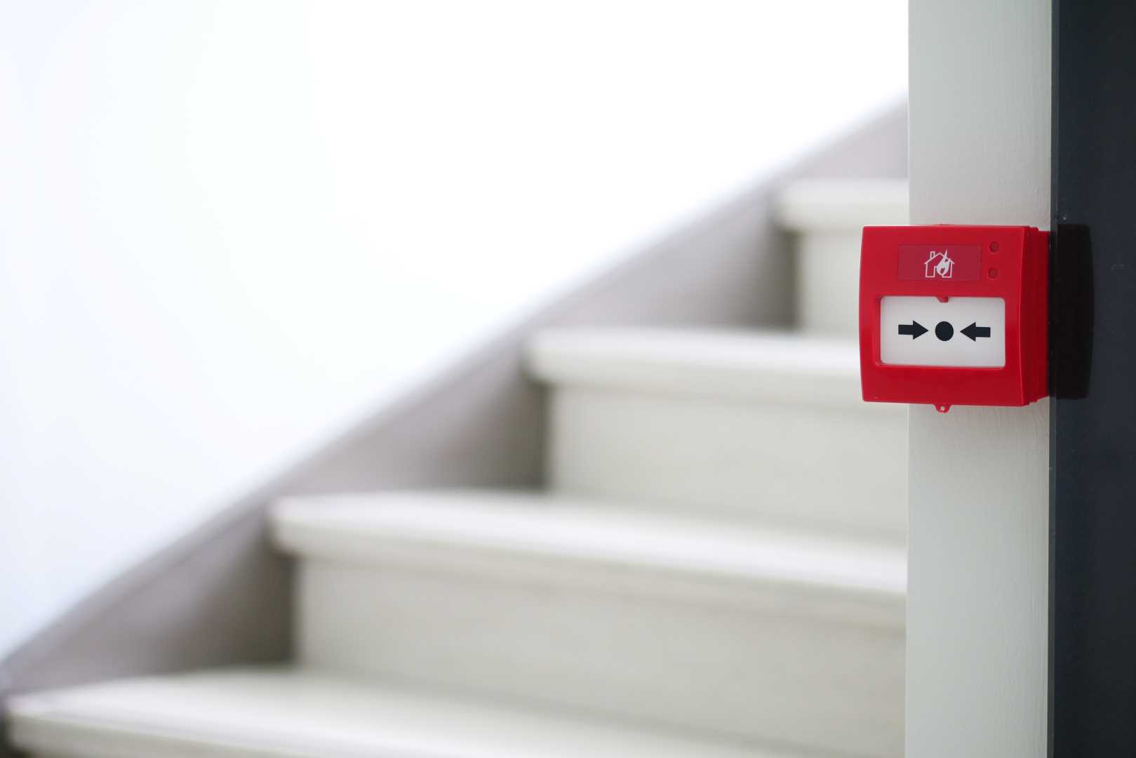 commercial-fire-alarm-system fire alarm next to stairs